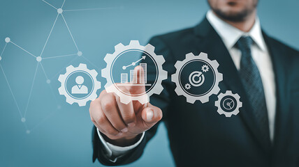 Businessman interacting with futuristic interface and gear icons