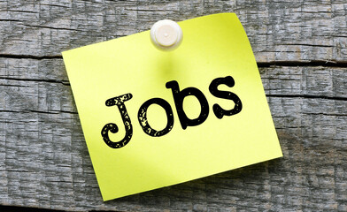 JOBS word on a small piece of paper. Business concept.