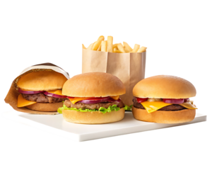Three cheeseburgers and fries on white plate isolated on a transparent background fast food meal