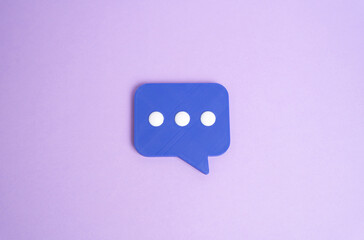 Purple comment on a pink background. Opinion and feedback. Review and comments. Online communication concept, public reaction, engagement culture and influence on brand perception