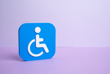 Symbol of a person with a disability on a lilac background. Legal status and benefits. Social rights concept, access to support, inclusion policies and formal recognition procedures