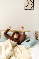Curly teenager relaxing in a cozy bedroom during a peaceful afternoon at home