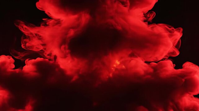 Abstract red cloud formation against black backdrop