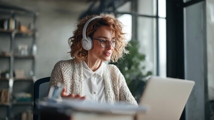 Engaging medium shot of HR professional conducting outreach via video call demonstrating innovative methods to connect with underrepresented candidate groups.