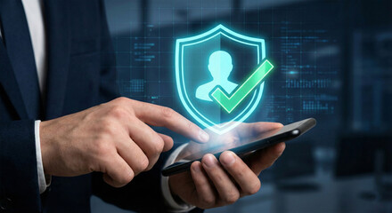 Businessman verifying identity on smartphone with secure shield icon