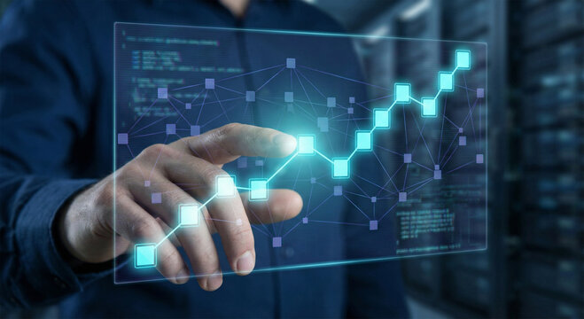 Businessman interacting with futuristic digital graph and network data - Powered by Adobe