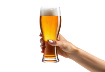 Hand holding wheat beer glass filled with golden amber brew and foam, isolated on a transparent background