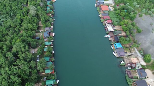 Aerial view of wooden river houses and fishing huts on Ada Bojana, Montenegro