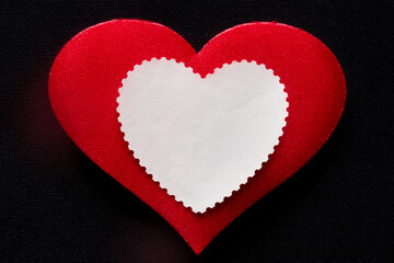 Vintage love mockup: empty white heart stamp label on red heart card. Romantic invitation or greeting layout, insert text and artwork. Photo