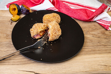 Austrian Zwetschgenkn&ouml;del or hungarian recipe szilv&aacute;s gomb&oacute;c szilv&aacute;s gomb&oacute;c and romanian gombot made with potatoes flour and plum filled dumplings