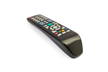 Over used black plastic tv remote with erased numbers, isolated on white background , soft focus perspective