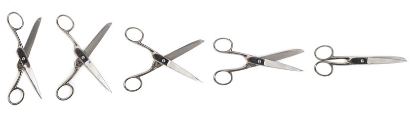 Scissors in different positions open wide to closed isolated on white banner