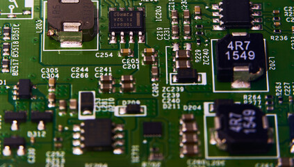 Close-up of electronic circuit board with integrated microchips.