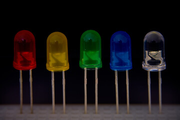 Colorful led diode with black background, close-up.