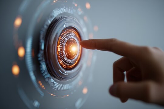 Close up of human hand touching glowing circular futuristic digital interface with orange light - Powered by Adobe