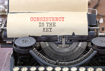 Consistency is the key symbol. Concept words Consistency is the key typed on beautiful old retro typewriter. Beautiful white paper background. Business consistency is the key concept. Copy space.