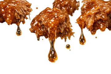 Honeycomb dripping with honey and a transparent background texture shot