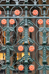 Manchester cathedral Ornate Green Wrought-Iron Gate With Coral Floral Emblems&mdash;Decorative Outdoor Fence Detail