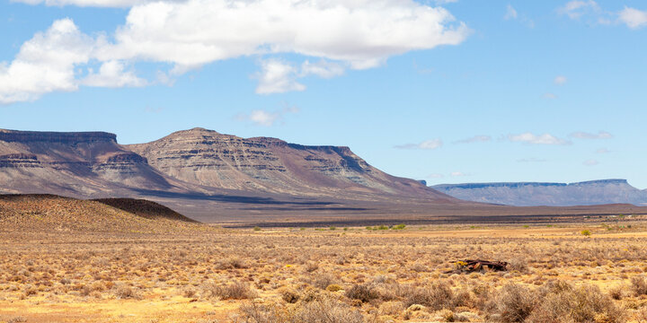 Arid landscape in the Great Karoo, Western Cape, South Africa with dolerite Koppies or flat-topped mountains