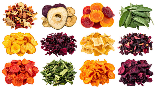 Assortment of dried fruits, vegetables, and herbs displayed on a black background