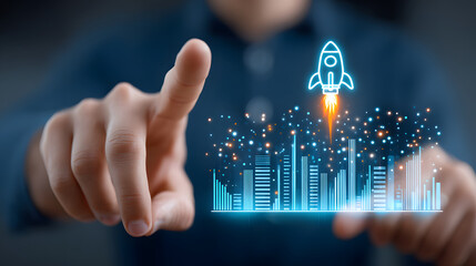 Businessman touching growth graph with rocket icon on virtual screen for digital sales strategy