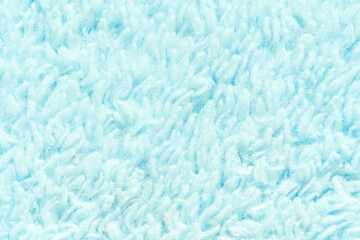Soft blue textile texture background with fluffy surface for cozy and warm designs. © elenavolf