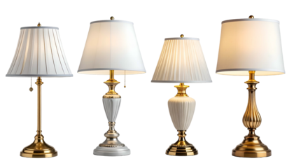 Four ornate table lamps with white shades and golden/silver bases against black