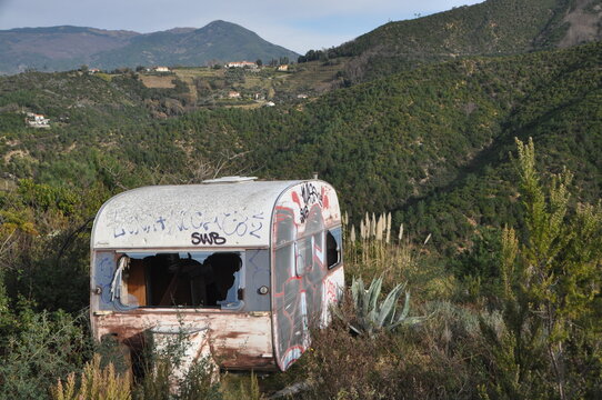 an old broken caravan parked near the trail from Riva Trigoso to Punta Baffe, Genoa province, Liguria, Italy