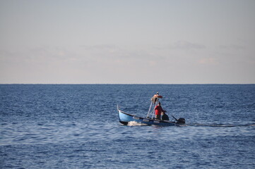 fishing in Framura on a sunny winter day, Liguria, Spezia province, Italy
