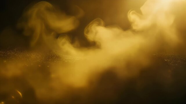 Animation footage video of golden smoke swirling in a dark space with a bright light source.