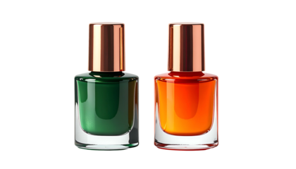 Two nail polish bottles, one green, one orange, with gold-toned caps, against black