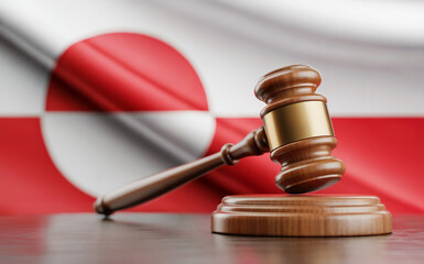 Wooden Judge Gavel on Sound Block with Greenland Flag Background for Legal Justice Concept