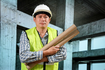 Civil engineers inspect building construction projects, checking the structural integrity and safety measures.
