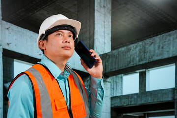 Civil engineers inspect building construction projects, checking the structural integrity and safety measures.