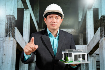 Civil engineers inspect building construction projects, checking the structural integrity and safety measures.