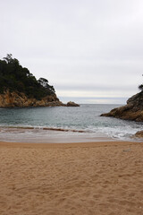 The view of Cala Pola beach in Tossa De Mar, Costa Brava, Spain                  