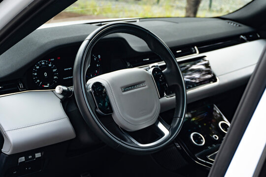 Grey Land Rover Range Rover Evoque steering wheel, Modern SUV cockpit interior