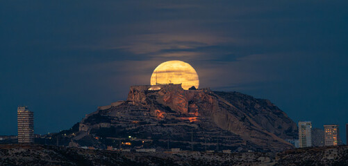 Super moon rising over santa barbara castle alicante spain © Araguatai