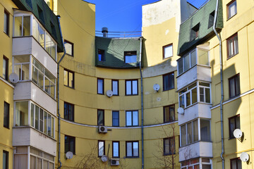 A curved multi-story residential building at 5 Vostochnaya Street in Moscow, Russia. Built in 1928.