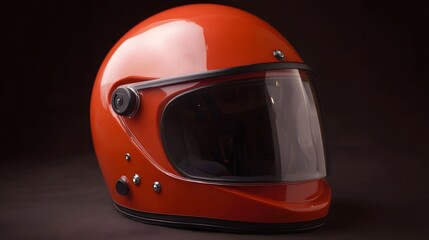 A glossy bright red full face motorcycle helmet with a dark tinted visor showcased against a plain black background in studio lighting