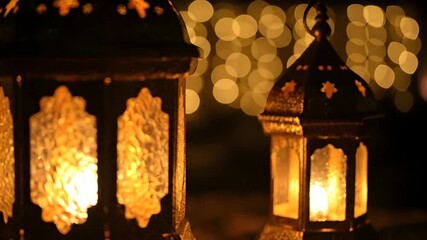 Captivating glow of two traditional ornate lanterns illuminating a peaceful night, creating a warm and festive atmosphere with soft, blurred background lights