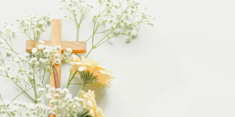 Fototapeten Gerbera Christian Cross with White Gypsophila and Yellow Gerbera Flowers on Light Blue Background With Copy Space. Concept of Easter Celebration, Palm Sunday, Religious Holidays, Grace and Spring Renewal  © KRISTINA KUPTSEVICH