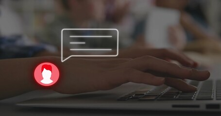 Typing hands pressing keys on laptop keyboard at cafe table, showing speech-bubble and red avatar