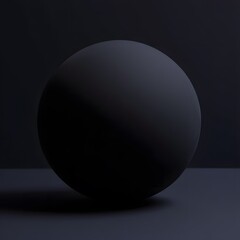 Black sphere on dark background, matte ball in studio lighting, shadow play