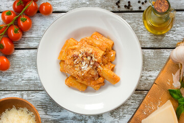 Amatriciana rigatoni or Rigatoni all&rsquo;amatriciana whit bacon and tomato sauce typical food of Rome area in Lazio region Italy