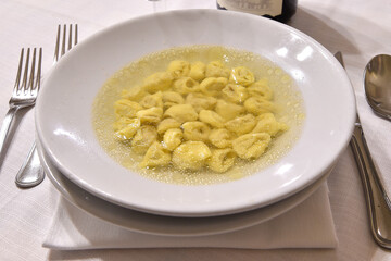Tortellini in brodo or tortellini in broth is typical food from Bologna and Emilia Romagna region in Italy