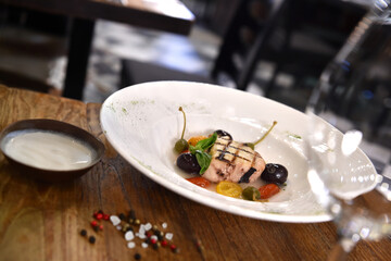 Tonno alla pantesca our grilled tuna whit capers and cherry tomatoes is typical food from trapani  and Sicilia region in Italy