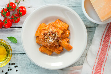 Amatriciana rigatoni or Rigatoni all&rsquo;amatriciana whit bacon and tomato sauce typical food of Rome area in Lazio region Italy