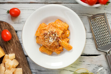 Amatriciana rigatoni or Rigatoni all&rsquo;amatriciana whit bacon and tomato sauce typical food of Rome area in Lazio region Italy