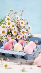 Easter eggs in pastel colors with fresh daisies in a springtime setting, celebrating the holiday season.